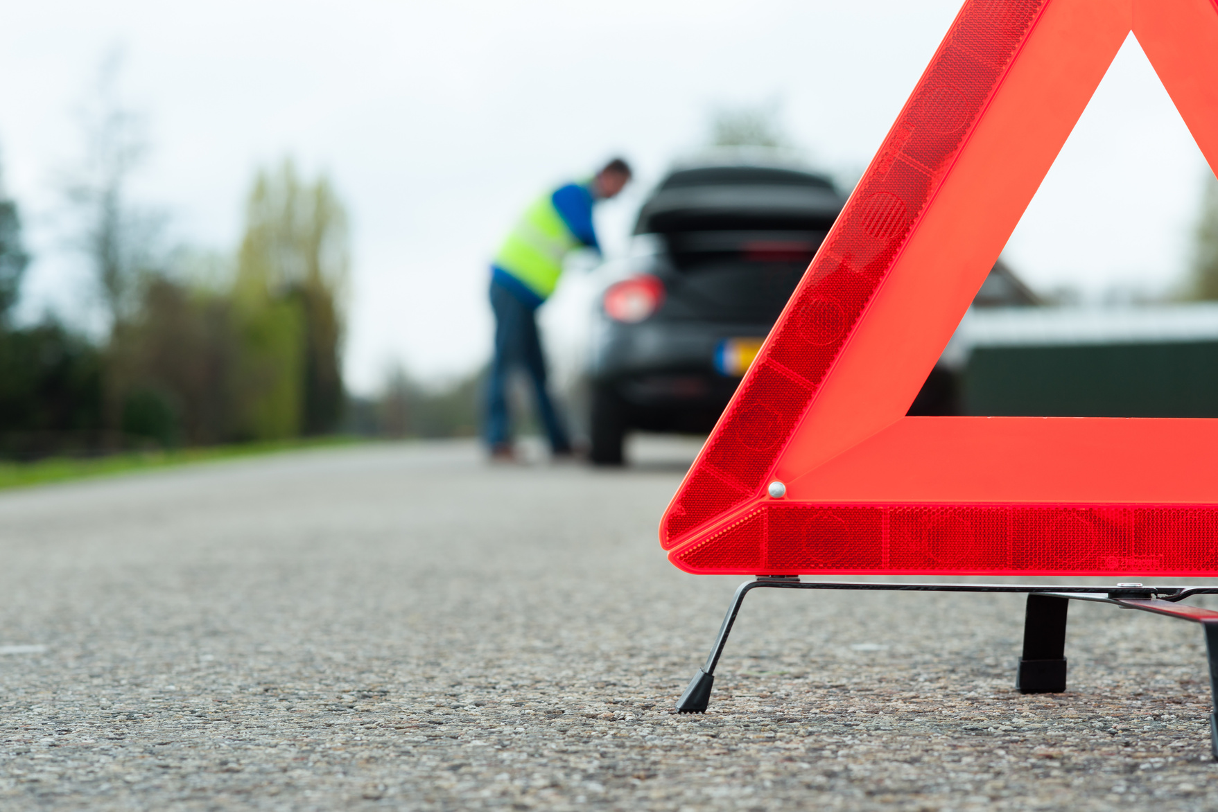 A driver receiving roadside assistance